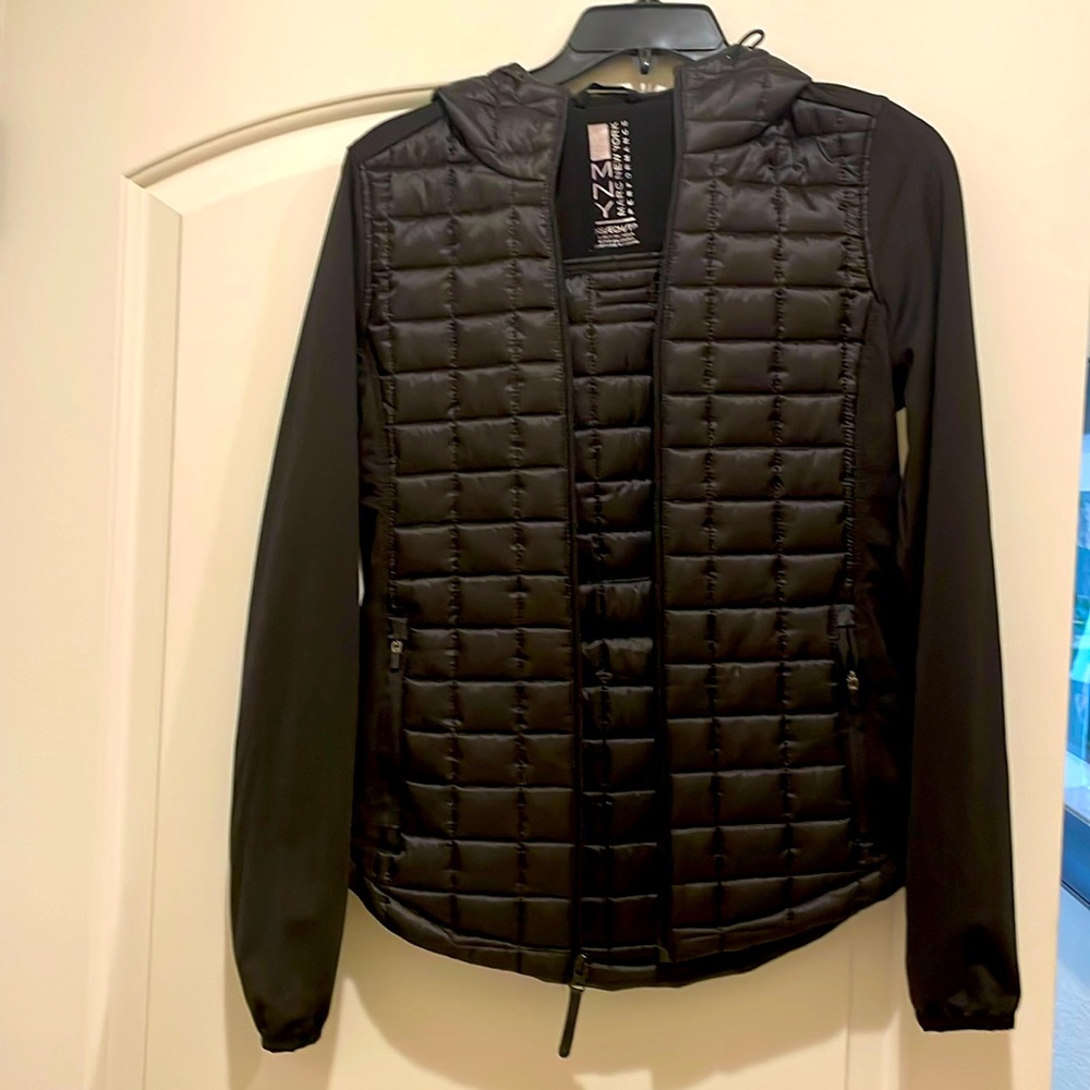 Black hooded puffer vest jacket.